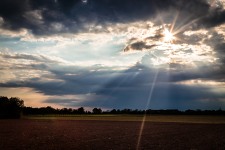 an evening storm in the italian countrysideの写真素材