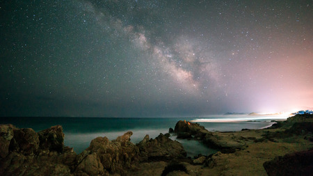 A beautiful milky way in the sky of Sardinia in a day of summerの写真素材