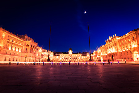 the beautiful square of Trieste with Christmas treesの写真素材
