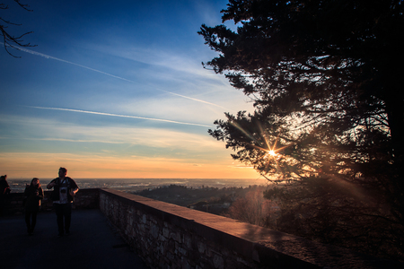 The sun goes down on the city of Bergamo, Italyの写真素材