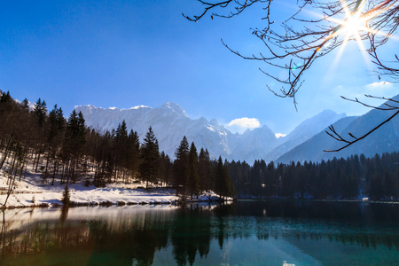 Spring is coming at the alpine lakeの写真素材