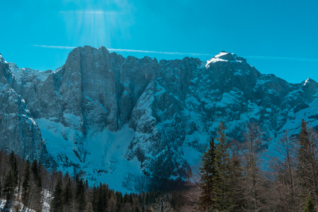 Sunset in front of the mount Mangart in the Italian Alps