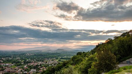 Sunset in a stormy evening in the fields of Friuli Venezia-Giulia, Italyの写真素材