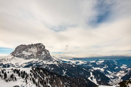 Clouds carrying snow in the italian alpsの写真素材