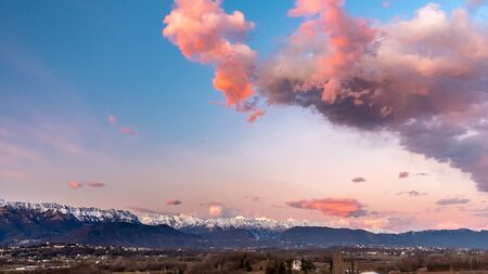 The sun goes behind the clouds over the countryside of Udine,  Friuli-Venezia Giulia, Italyの写真素材