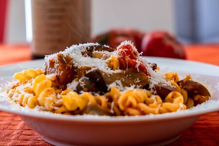 Pasta alla norma, with tomatoes and eggplants, a recipie from sicilyの写真素材