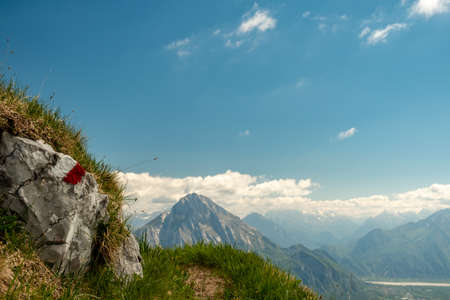 Reaching the top of a mountain in the Carnic Alps, Friuli-Venezia Giulia, Italy