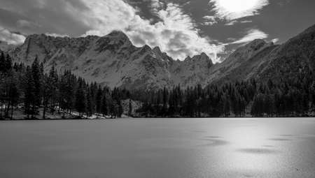 Sunset in front of the mount Mangart in the Italian Alpsの写真素材