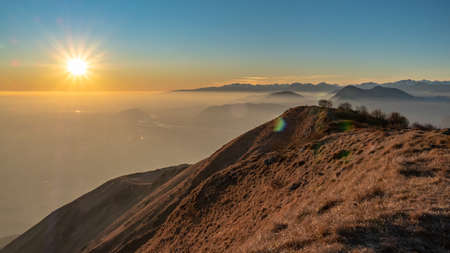 Sunset at the Cuarnan peak, Friuli-Venezia Giulia Region, in a freezing winter dayの写真素材