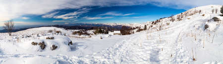 The mount Matajur, in Italy, in a sunny winter dayの写真素材