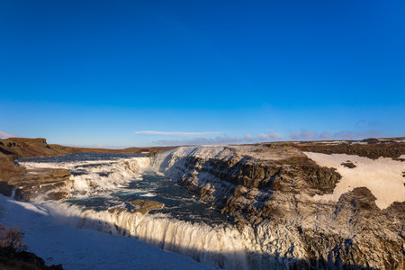 Snow and ice at gullfoss waterfall in icelandの写真素材