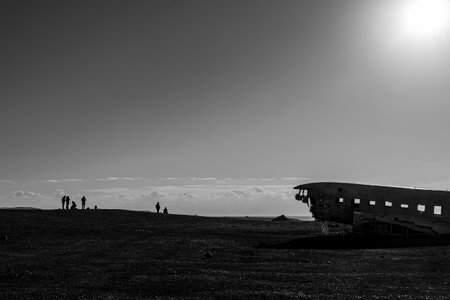 Near the Solheimafjara wrecked plane in a cold march day in icelandの写真素材