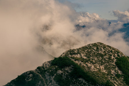 October foggy day in the alps of Friuli-Venezia Giulia, Italyの写真素材