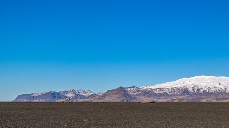 Near the Solheimafjara wrecked plane in a cold march day in icelandの写真素材