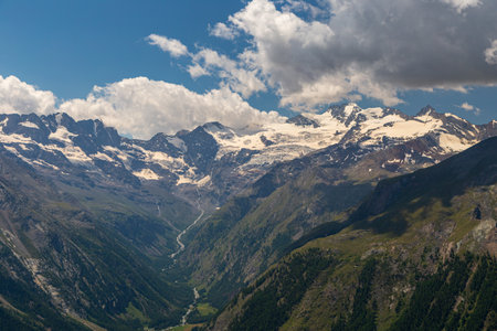 The beautiful valley in front of the Gran Paradiso in a summer dayの写真素材