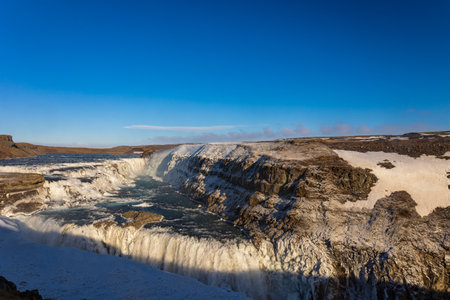 Snow and ice at gullfoss waterfall in icelandの写真素材