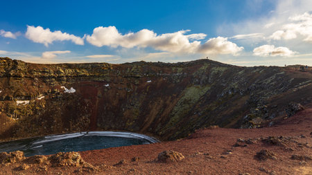 Kerid lake is totally frost on a cold march day in icelandの写真素材