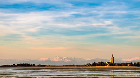 The ancient Sanctuary of Barbana with snowy mountains in the backgroundの写真素材