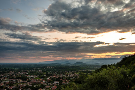 Sunset in a stormy evening in the fields of Friuli Venezia-Giulia, Italyの写真素材