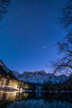 Frosty winter sunset at the lakes of Fusine, Friuli Venezia Giulia, Italy