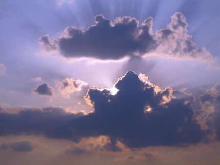 The sun shining through low cloud 
