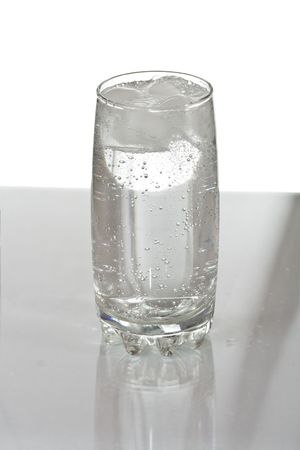 Glass of water with iceの写真素材