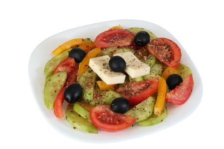 greek salad isolated on whiteの写真素材