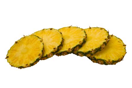 Slices of pineapple isolated on whiteの写真素材
