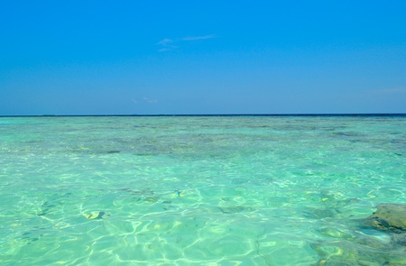 Panorama of a crystal transparent sea and blue skyの写真素材