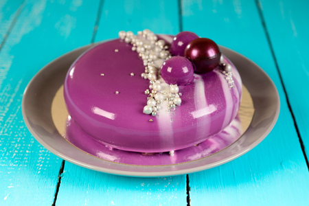 mirror glaze mousse cake with coconut biscuitsの写真素材