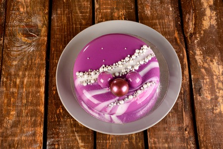 mirror glaze mousse cake with coconut biscuitsの写真素材