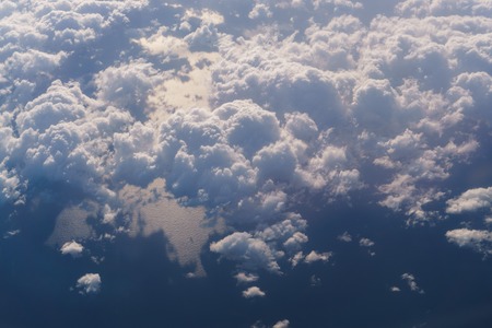 the view of the sky from an airplane windowの写真素材
