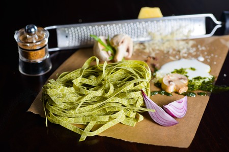 ingredients, milk and mushrooms, for the preparation of the green pasteの写真素材