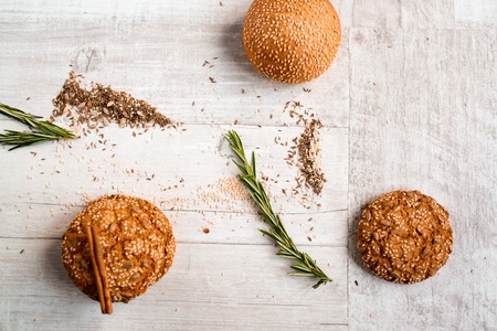 Warm Homemade ginger biscuit cookie topped with sugar and sesame seeds