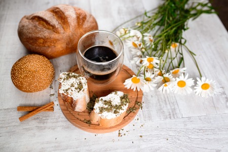 Fresh bread on the table. Background food.の写真素材