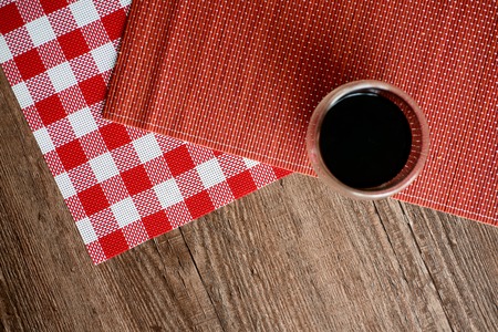Top view Cup of coffee on a wooden table.の写真素材