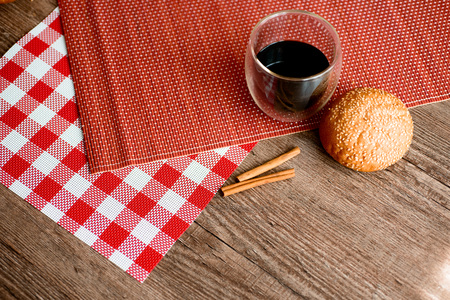 Fresh bread, cookies and coffee on wooden table.の写真素材