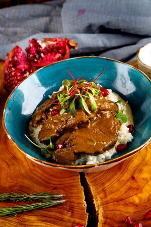 beef cheeks stewed in sauce with mashed potatoes, Spanish cuisine, steak, barbecueの写真素材