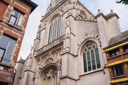 St. Paul's Church Sint-Pauluskerk, a Roman Catholic Church with a crucifix in Antwerp on a Sunny dayの写真素材