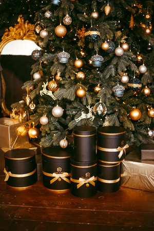 boxes of Christmas gifts under the tree