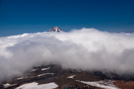 view of the peaks of the Koryak volcano on the Kamchatka peninsulaの写真素材