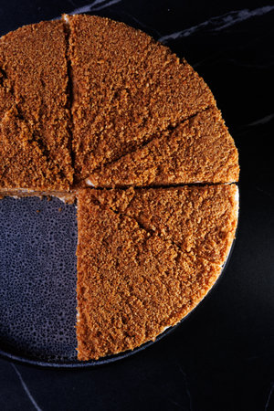 Layered Crumb Cake With Cream Filling On Dark Plate, Delicious Dessert
