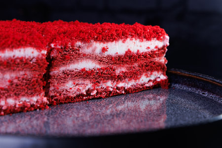 Red velvet cake with cream cheese filling on a white isolated background. toning. selective focusの写真素材