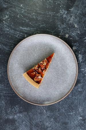 Caramel Pecan Pie Slice On Plate, Rich Dessert With Nuts And Creamy Filling