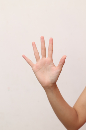 beautiful woman hand showing gestureの写真素材