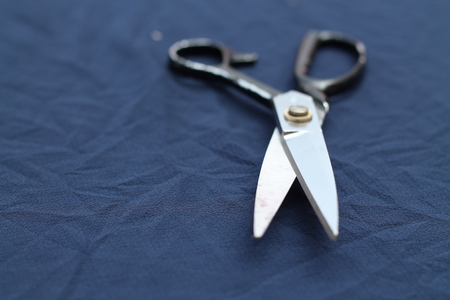 Scissors on dark backgroundの写真素材