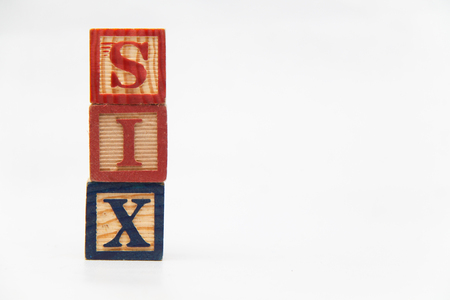 The arrangement of letters forms one word, "SIX"の写真素材
