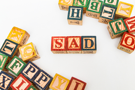 The arrangement of letters forms one word, "SAD"の写真素材