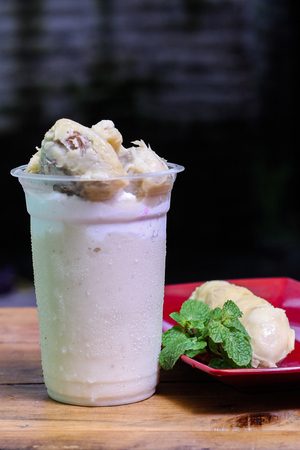 milkshake with durian pieces, in  plastic cup, delicious and fresh.の写真素材