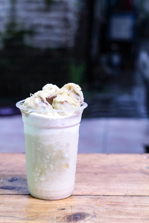 milkshake with durian pieces, in  plastic cup, delicious and fresh.の写真素材